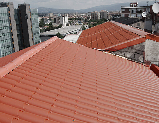 Imagen de cubierta tejado, con curva, imitación teja antigua.